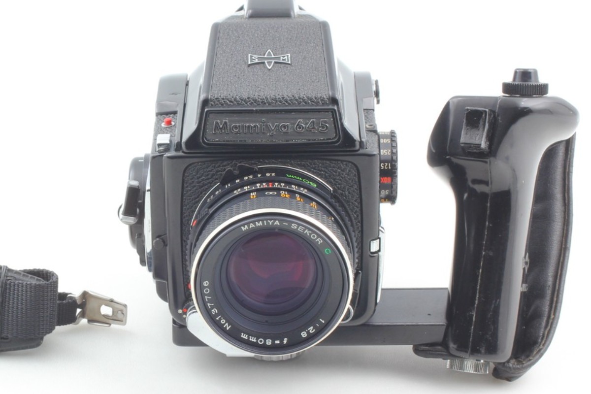 Mamiya M645 1000S with Sekor C 80mm f/2.8 and grip, front view